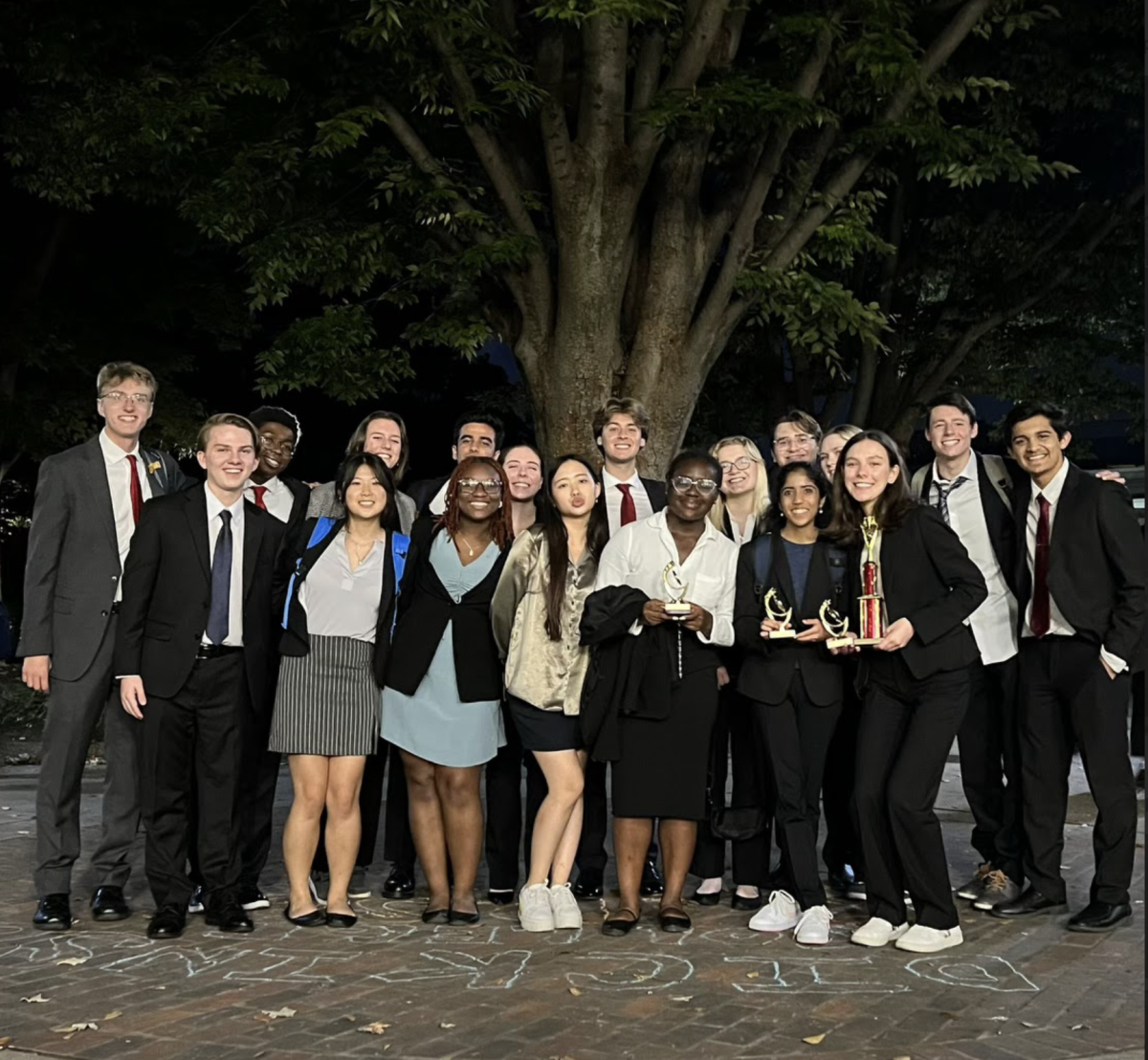 The Mock Trial team shows off their award from the competition. 